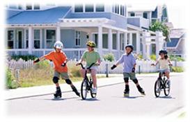 Kids wearing helmets while cycling & skating